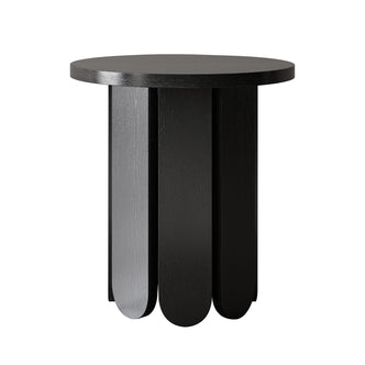 Hugo 45cm Round Side Table with Curve Detail in Black features a sculptural base of vertically arranged, rounded-end wooden slats, topped with a sleek, round matte black surface.