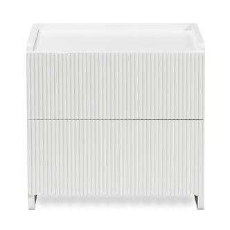 Nasrin 2 Drawer Bedside Table in White, featuring a matte finish, vertical ribbed drawer fronts, low-lip top surface, and short legs, offering modern elegance and functionality.
