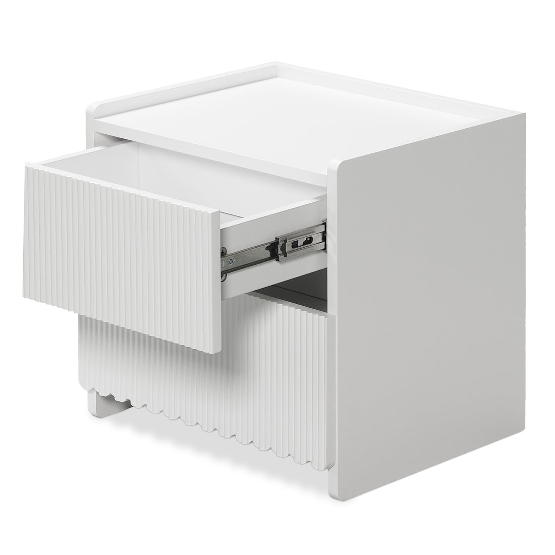Nasrin 2 Drawer Bedside Table in White features a minimalist design with vertically fluted drawer fronts, short block-style legs, and a partially open top drawer revealing metal slides.