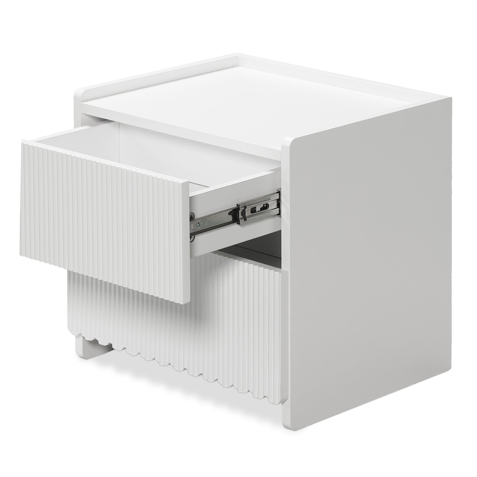 Nasrin 2 Drawer Bedside Table in White features a minimalist design with vertically fluted drawer fronts, short block-style legs, and a partially open top drawer revealing metal slides.