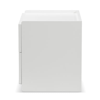Nasrin 2 Drawer Bedside Table in White, showcasing a sleek, cube-shaped design with smooth edges and two visible drawers, ideal for modern bedrooms.