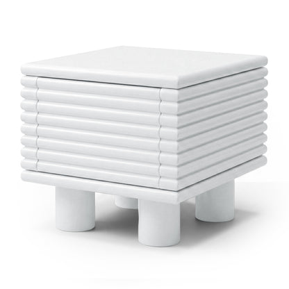 White modern side table with ribbed texture on a white background