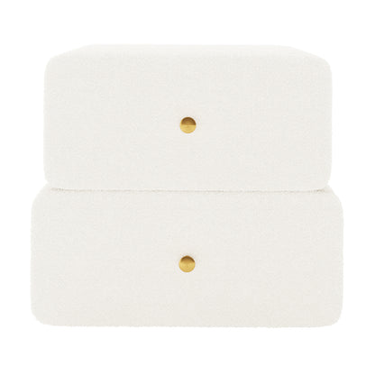 Tyla Boucle Bedside Table in Cream White, features a minimalist two-tier design with textured bouclé upholstery, two drawers each with a central brass-tone knob, enhancing bedroom elegance and functionality.