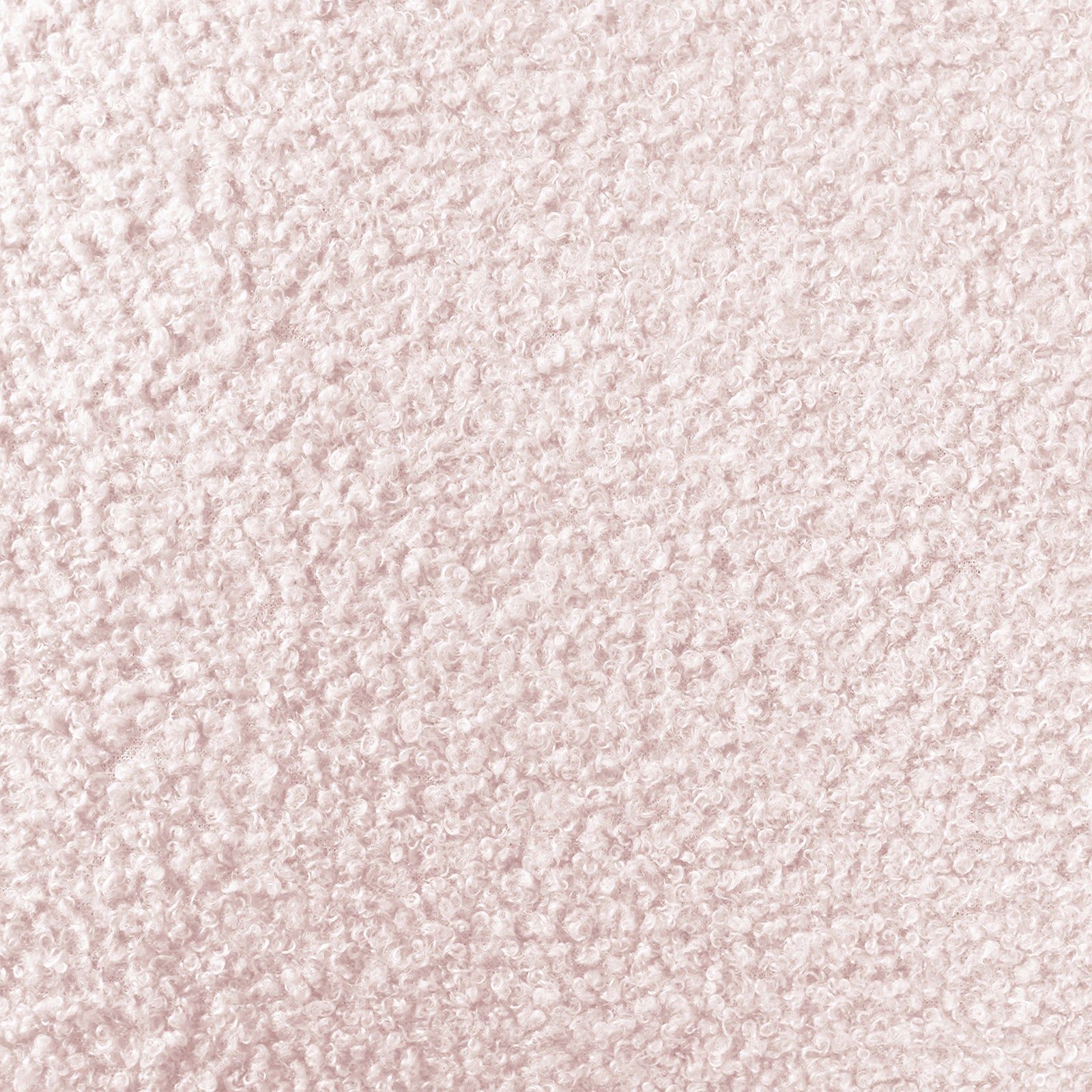 Tyla Boucle Upholstered Bedside Table features a close-up of light pink boucle fabric, showcasing its plush, nubby texture with tightly packed looped fibers, highlighting its soft sophistication and modern elegance.