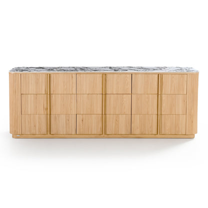 Light oak sideboard with sintered stone marble-look top, rounded edges, and vertical groove detailing on cabinet doors