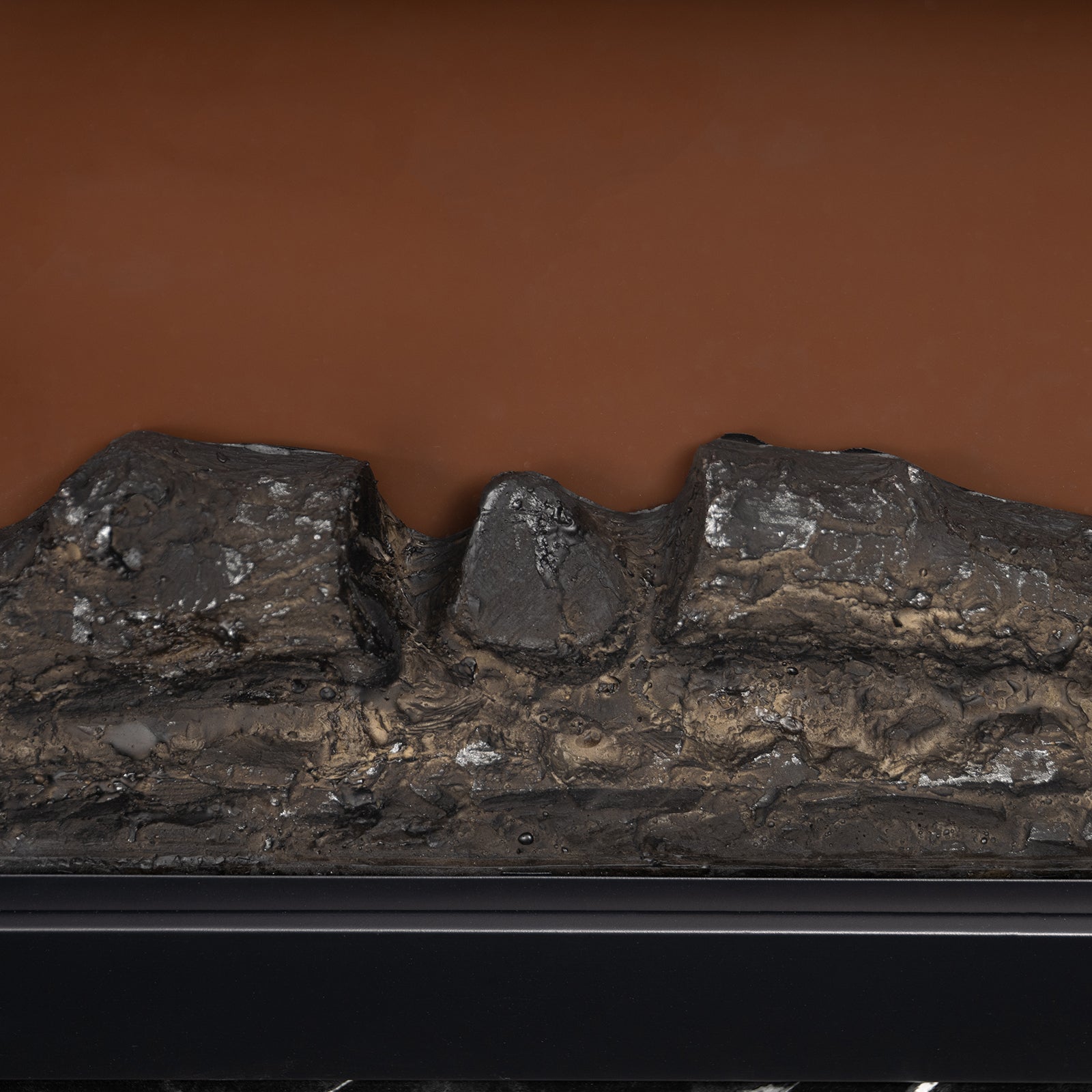Close-up decorative logs of Awaba Electric Fireplace 1950W with LED Flame and Timer - White Marble