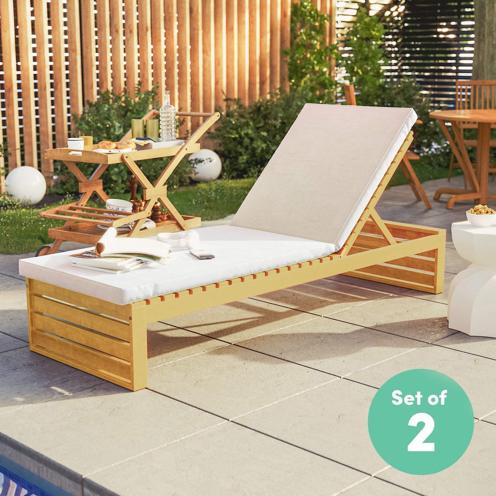 Alabat Hardwood Outdoor Sun Lounger Set of 2 in Cream by a pool, featuring a wooden adjustable-back design on a tiled deck, complemented by a serving cart and side table in the background.