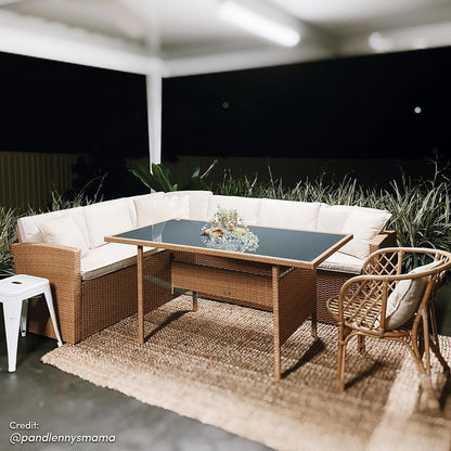 Ballena 6 Seater Wicker Outdoor Dining Sofa Set – Beige/Light Beige; features a wicker chair with a pillow, a clear glass-top table, and a woven wicker design for stylish outdoor dining.