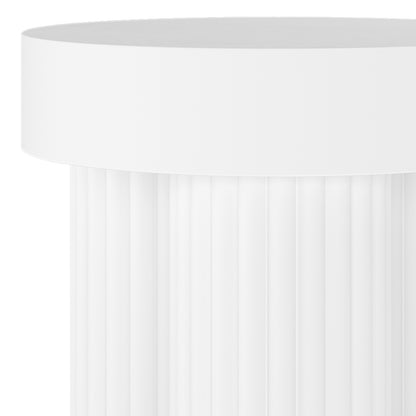 Close-up of the Basalt & Salvo Outdoor Concrete Coffee Table Set in White, showcasing its cylindrical form with vertical flutes, resembling a pleated drum or column shaft.