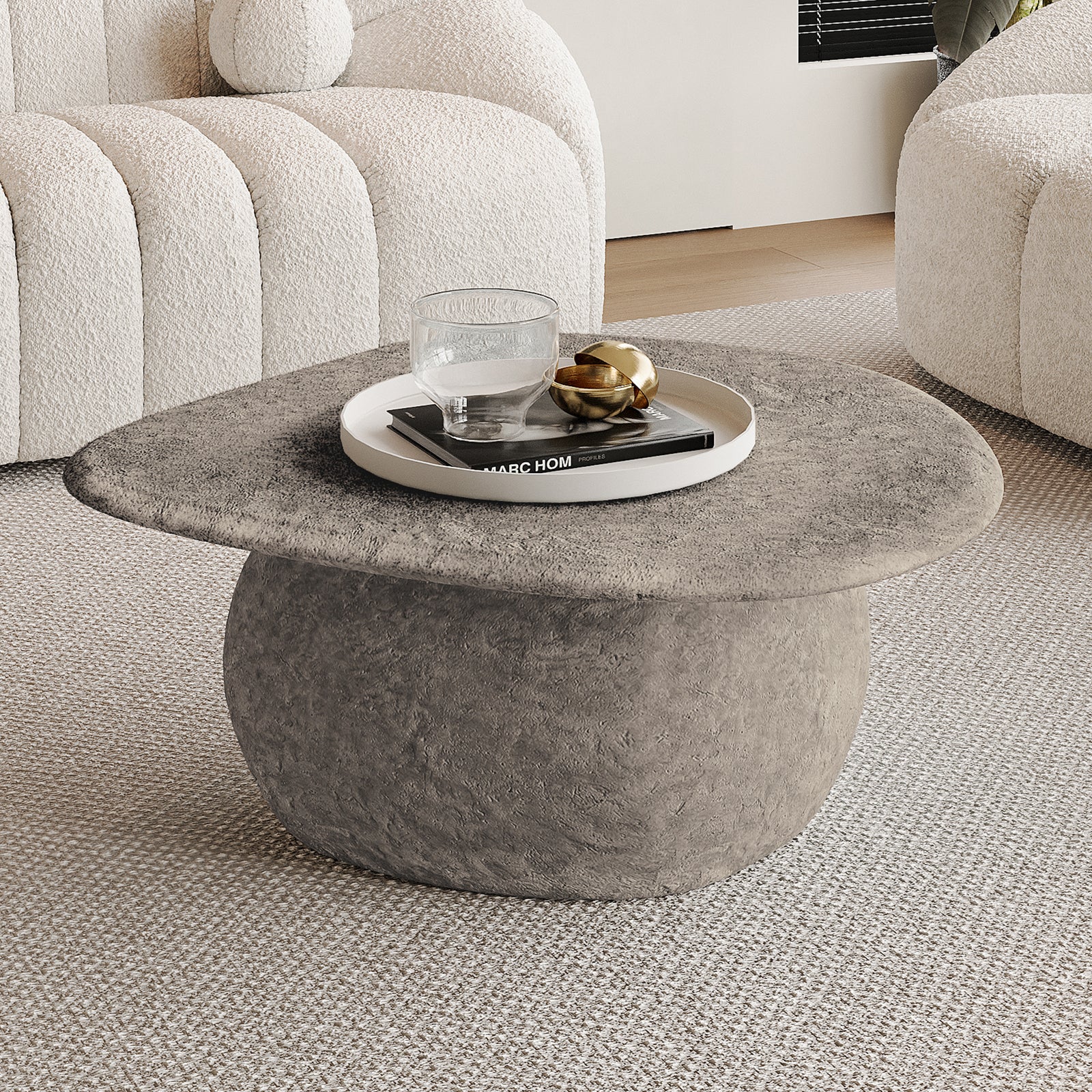 Cam Indoor & Outdoor Round Concrete Coffee Table - Stone; features a smooth, round concrete surface ideal for modern farmhouse decor, reflecting durability and style, perfect for both indoor and outdoor settings.