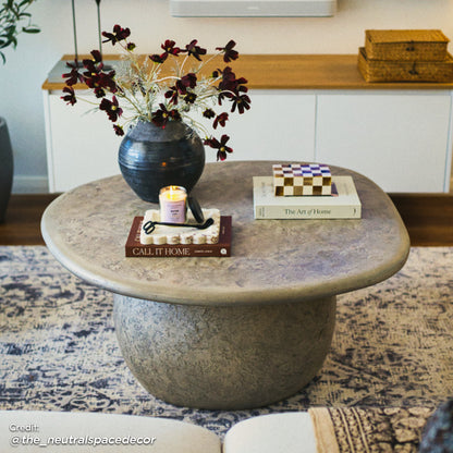 Cam Indoor & Outdoor Round Concrete Coffee Table – Stone; a sturdy, weatherproof round table with a textured concrete finish, ideal for both modern farmhouse living rooms and outdoor settings.