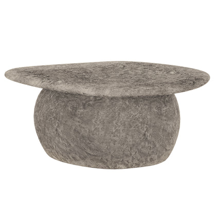 Cam Indoor & Outdoor Round Concrete Coffee Table - Stone, showcasing its organic round shape and textured concrete surface, highlighting its modern farmhouse style, durability, and suitability for indoor and outdoor use.