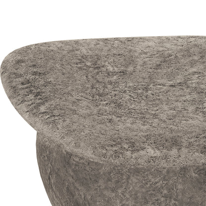 Close-up of the Cam Indoor & Outdoor Round Concrete Coffee Table – Stone, showcasing its textured concrete surface and robust round shape, emphasizing its modern farmhouse aesthetic and durable design.