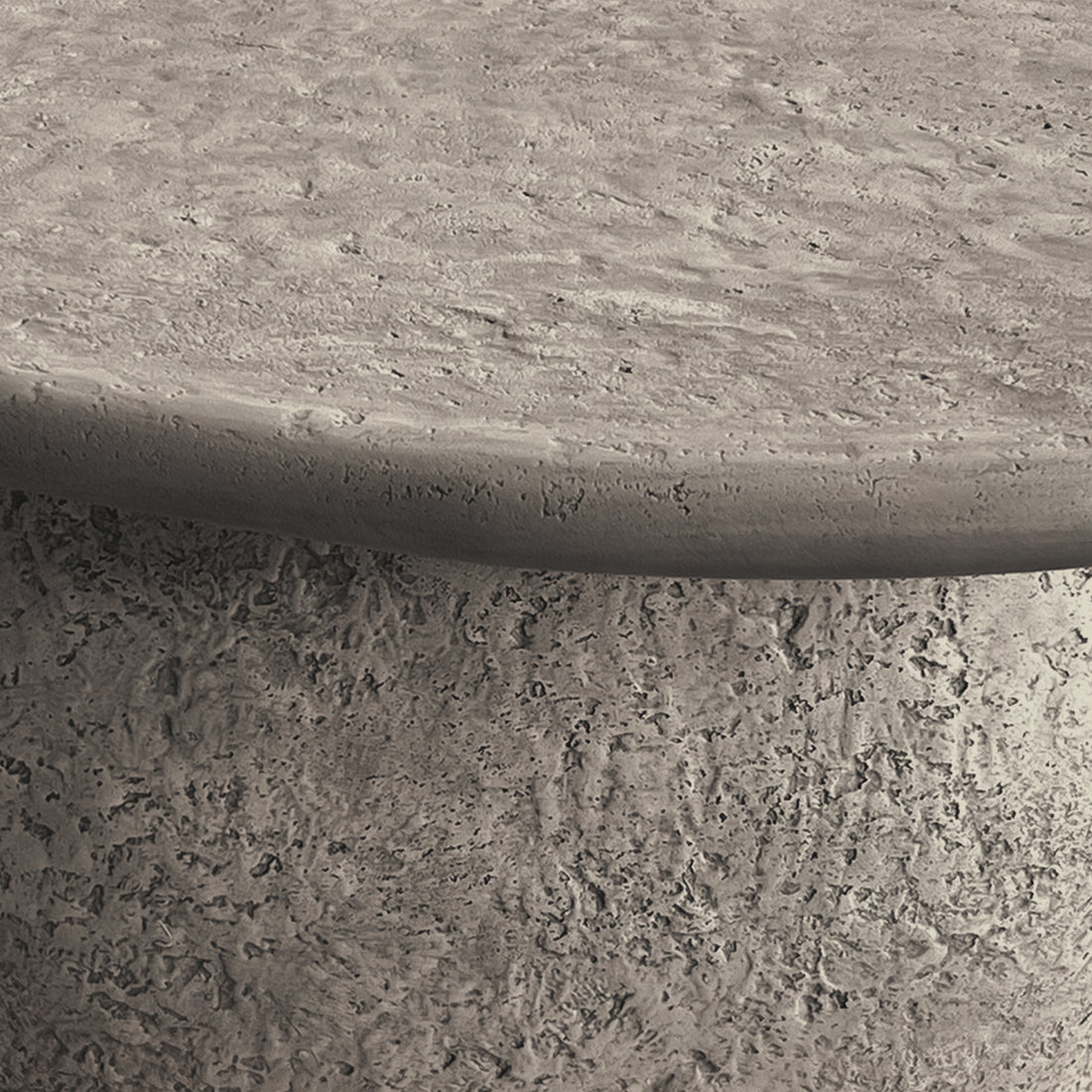 Cam Indoor & Outdoor Round Concrete Coffee Table – Stone, featuring a robust, weatherproof design with a textured, organic round shape. Perfect for modern farmhouse aesthetics in both indoor and outdoor settings.