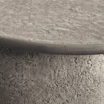 Cam Indoor & Outdoor Round Concrete Coffee Table – Stone, featuring a robust, weatherproof design with a textured, organic round shape. Perfect for modern farmhouse aesthetics in both indoor and outdoor settings.