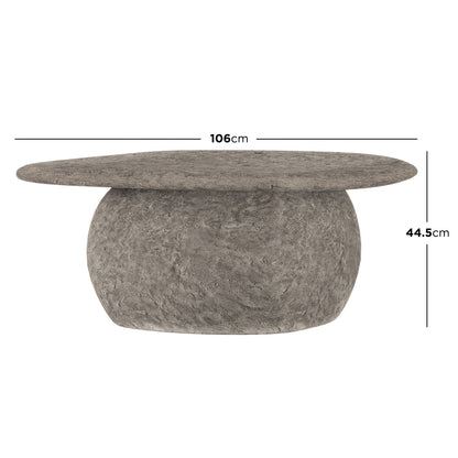 Cam Indoor & Outdoor Round Concrete Coffee Table - Stone; a robust, weatherproof table with an organic round shape and natural concrete texture, ideal for enhancing both indoor and outdoor modern farmhouse settings.