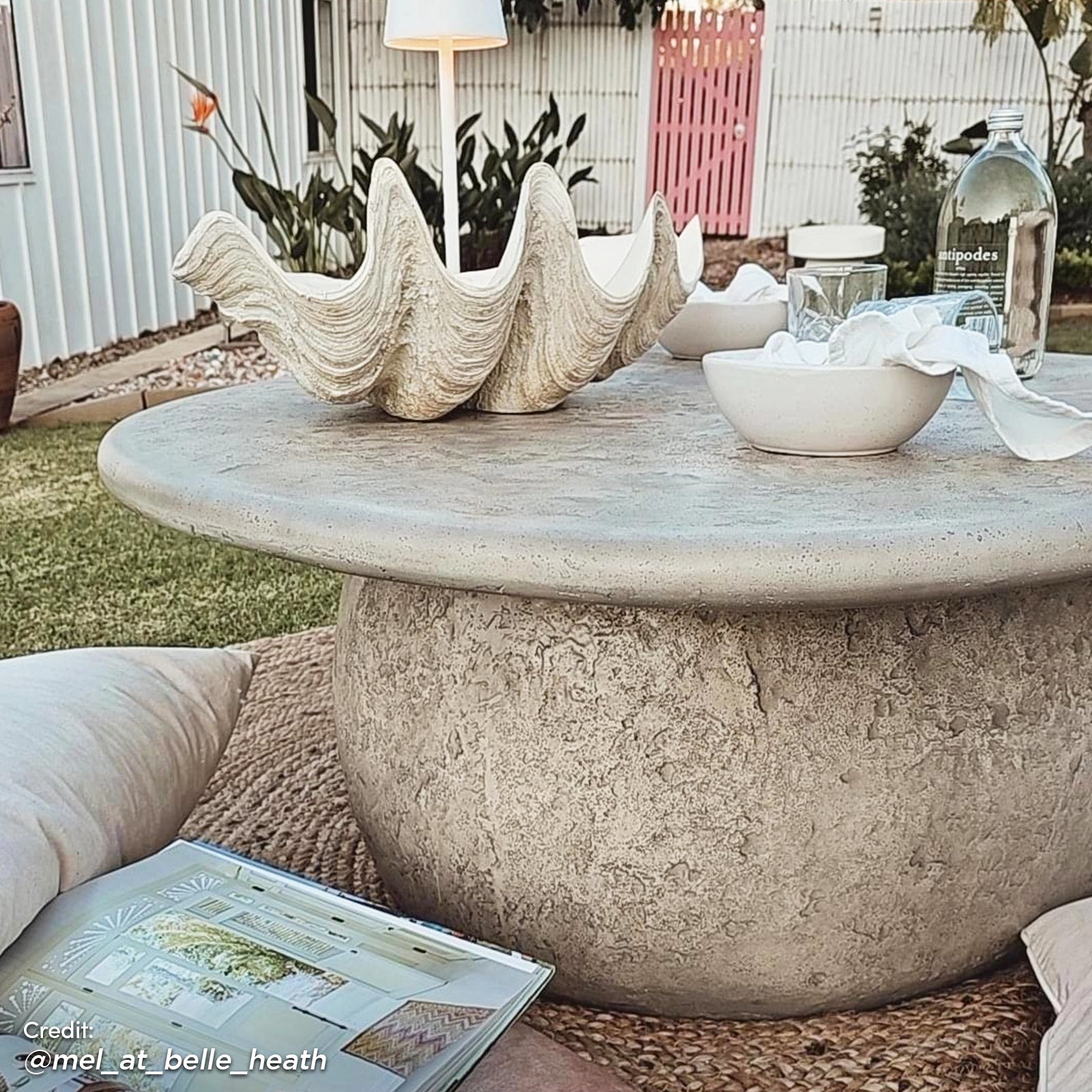 Cam Indoor & Outdoor Round Concrete Coffee Table – Stone features a sturdy, organic round design with a textured surface, showcasing its modern farmhouse appeal for both indoor and outdoor settings.