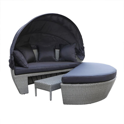 Erith Wicker Outdoor Furniture Day Bed w/ Canopy features a sleek design, visible with a comfortable cushion setup, perfect for outdoor relaxation and entertainment, highlighting its stylish and functional build.