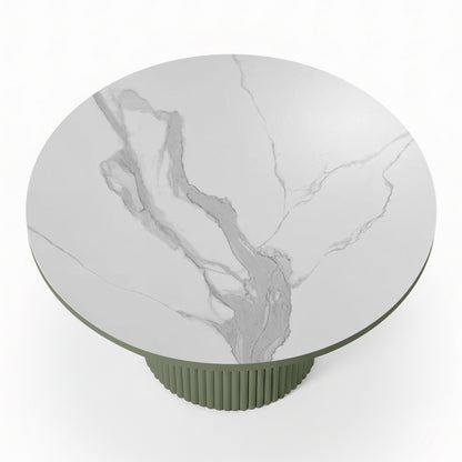 Evone 4 Seater Stone Outdoor Dining Table Set features a white marble tabletop with gray veining on a muted green, fluted pedestal base, ideal for modern outdoor dining.