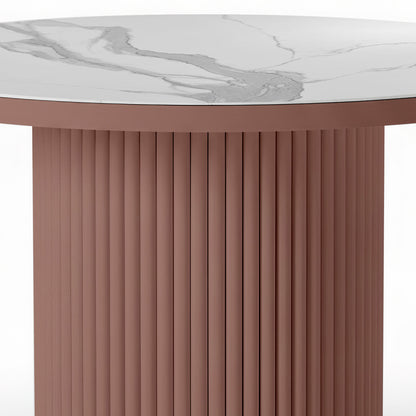 Evone Aluminium Outdoor Dining Table in Terracotta with a round white marble-look top featuring gray veining, supported by a cylindrical, fluted terracotta base, designed for outdoor durability and style.