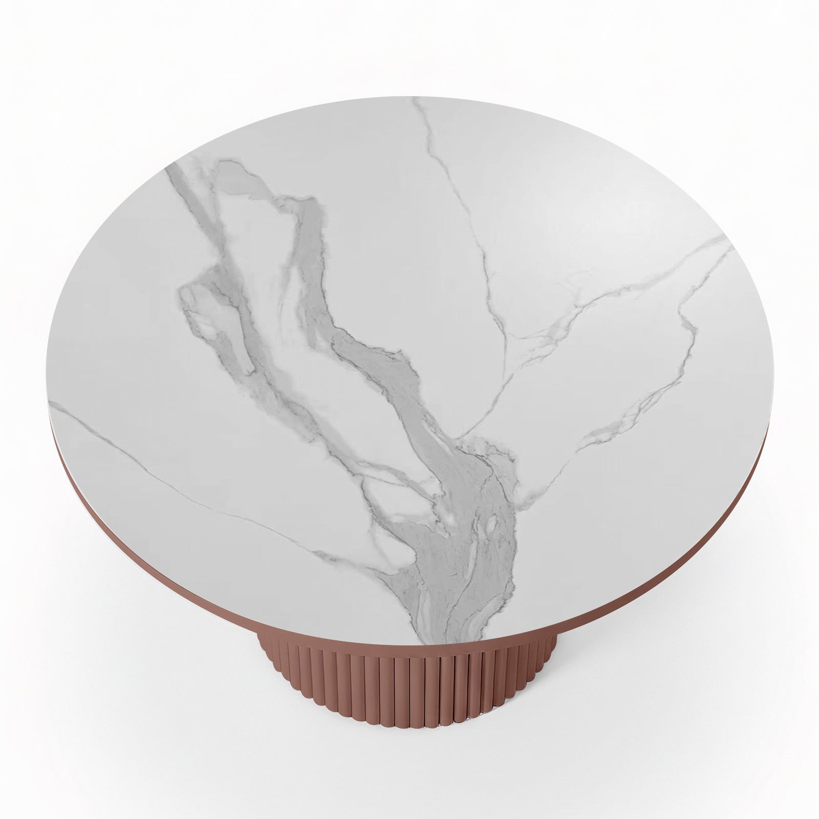 Top-down view of a round white stone dining table with grey marble-effect veining and a terracotta-colored fluted pedestal base.