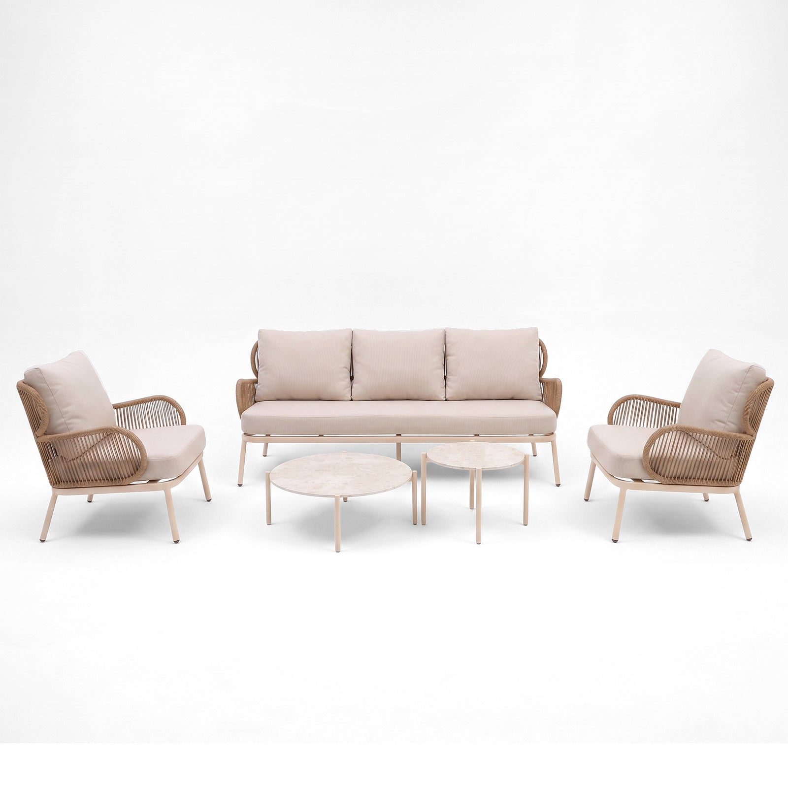 Modern seating set with sofa, two armchairs, and two round coffee tables on a white background