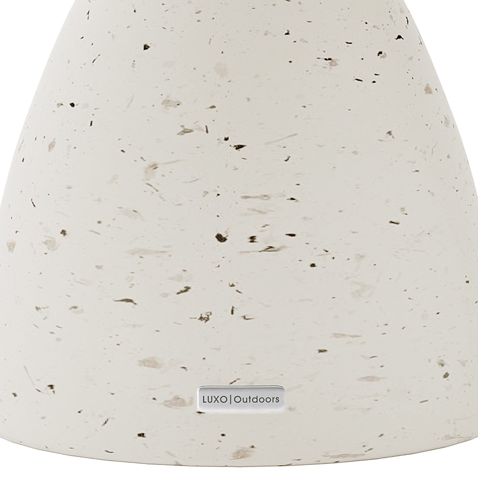 Detail shot of the Junia Terrazzo concrete side table's speckled surface and base, featuring the Luxo Outdoors tag