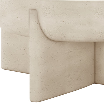 Detail shot of the Kora Antique White concrete coffee table's base and textured finish