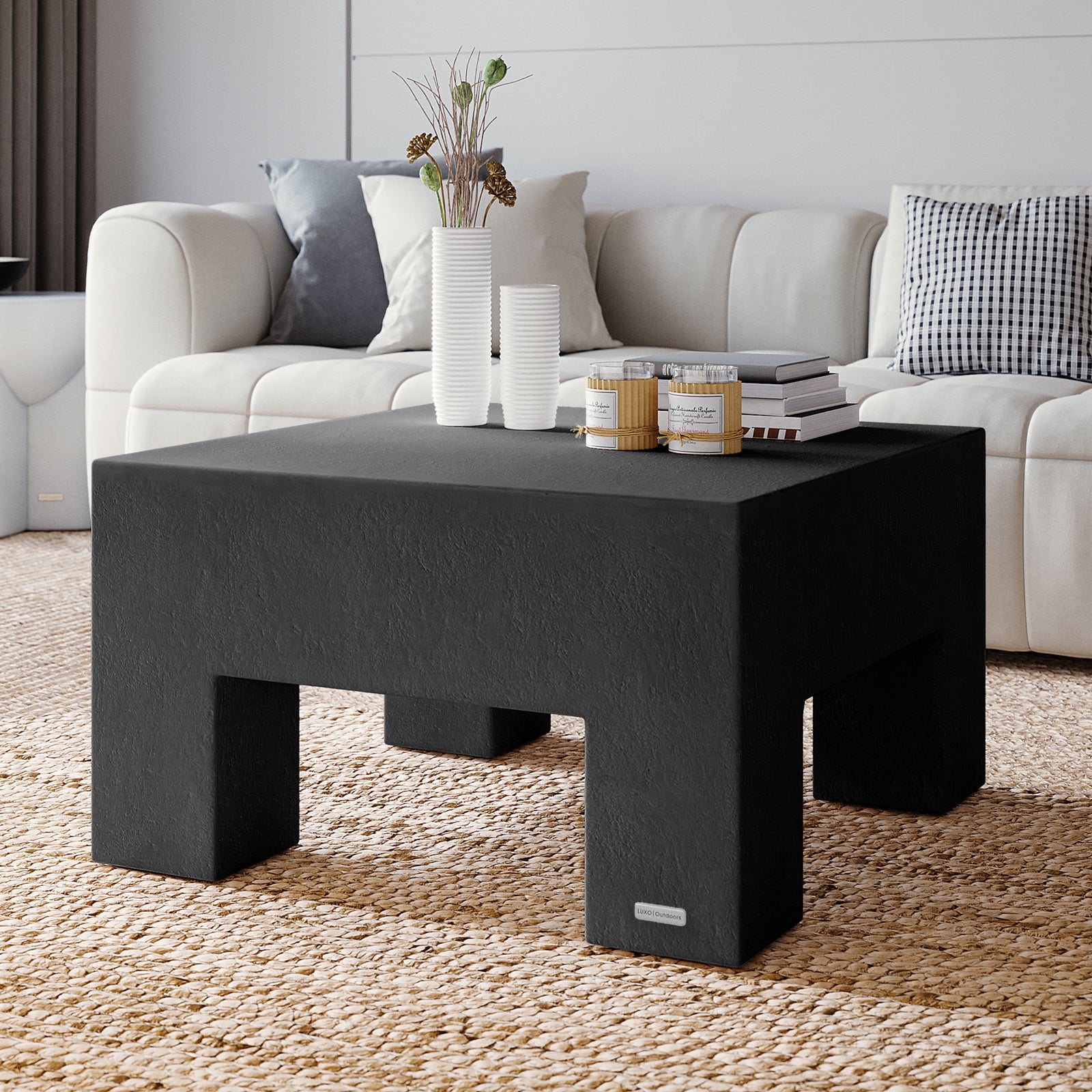 Maxon Black Concrete Coffee Table styled in a contemporary living room with decor, perfect for indoor outdoor entertaining - Lifestyle