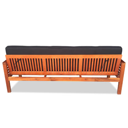 Luxo Meves Timber Outdoor Sofa Bed Black, featuring a wooden frame with a black cushion, transforms from a stylish bench to a sun lounge bed with foldable backrest and round pillows.