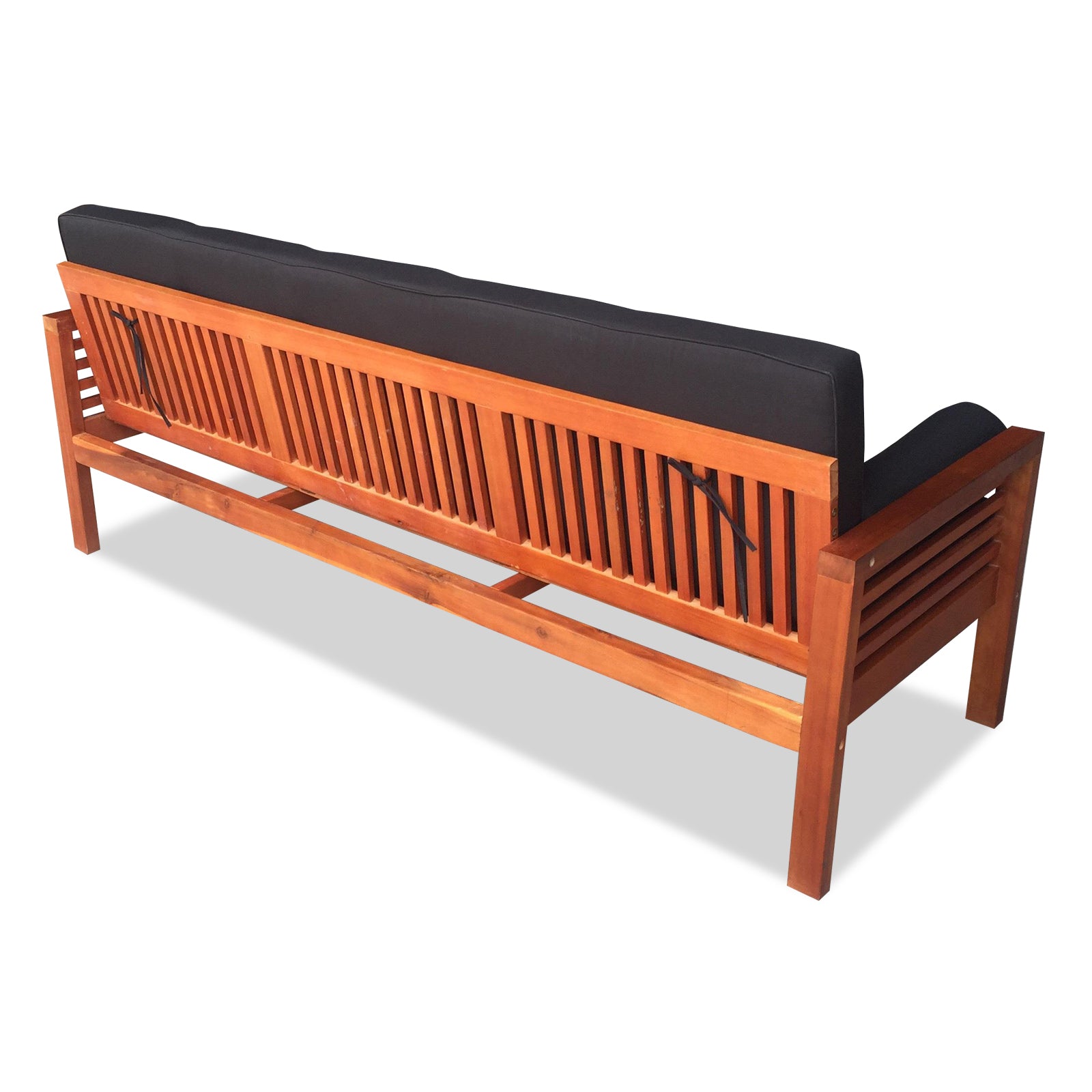 Luxo Meves Timber Outdoor Sofa Bed Black with wooden frame, black cushion, and convertible backrest, showcasing its versatility as both an outdoor sofa and bed for stylish patio lounging.
