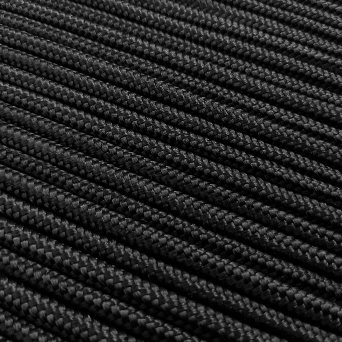 Close-up of black rope accents on the Pangee 6-Seater Timber Outdoor Dining Set, highlighting its modern Mediterranean design with soft webbed seating for comfort and durability.
