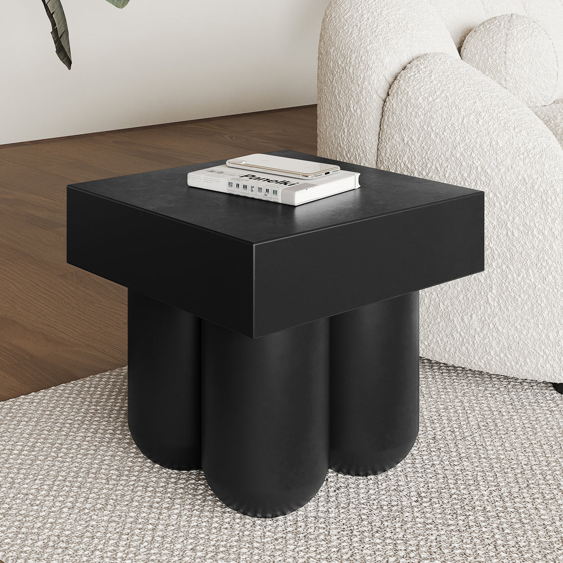Rissa Indoor & Outdoor Cone Base Concrete Side Table on a coffee table, showcasing its sleek square tabletop and four cone-shaped legs, highlighting its modern design suitable for versatile indoor and outdoor use.