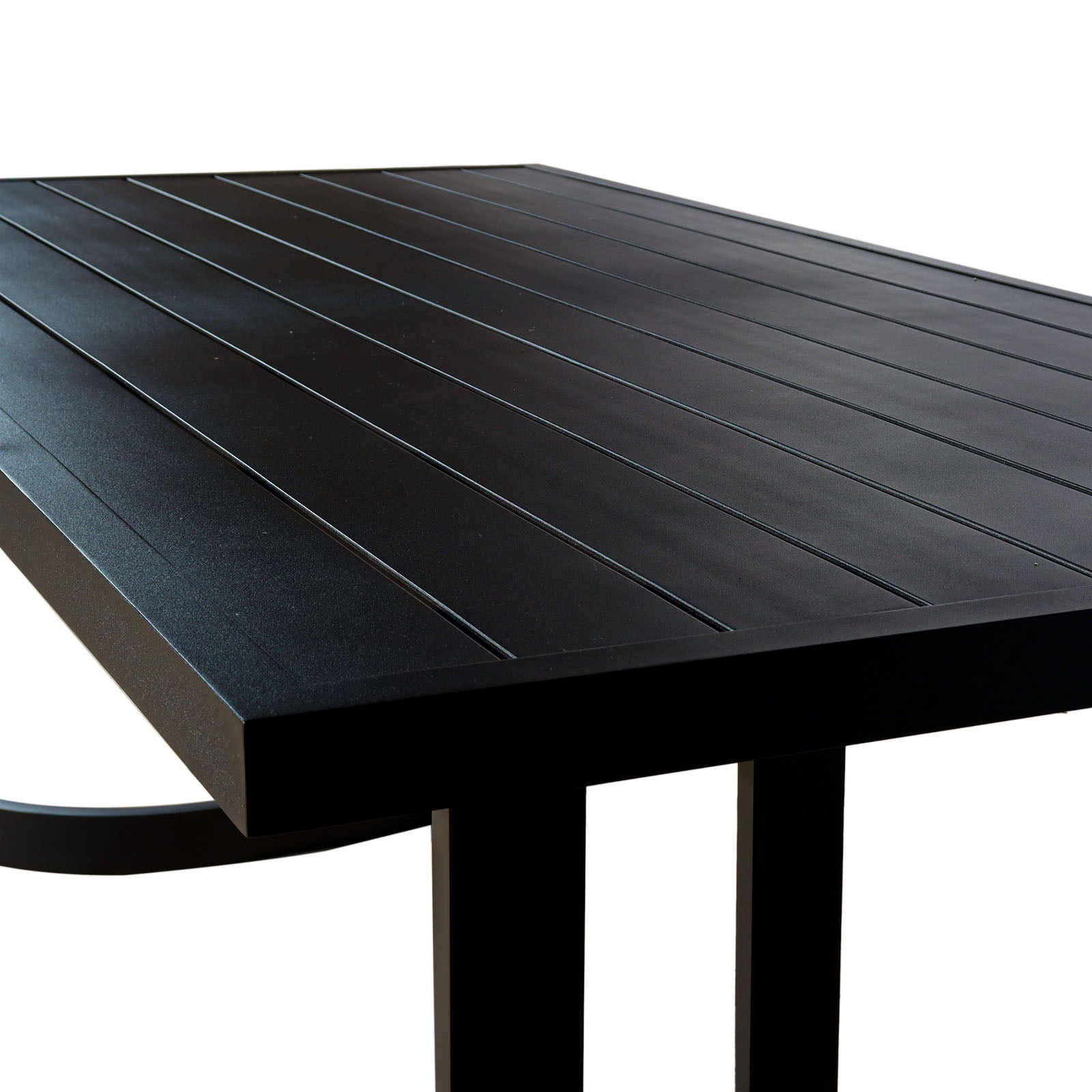 Tavari 6-Seater Aluminium Outdoor Dining Set in Black features a matte-black tabletop with narrow grooves, beveled edges, and sturdy legs, showcasing modern design ideal for outdoor settings.