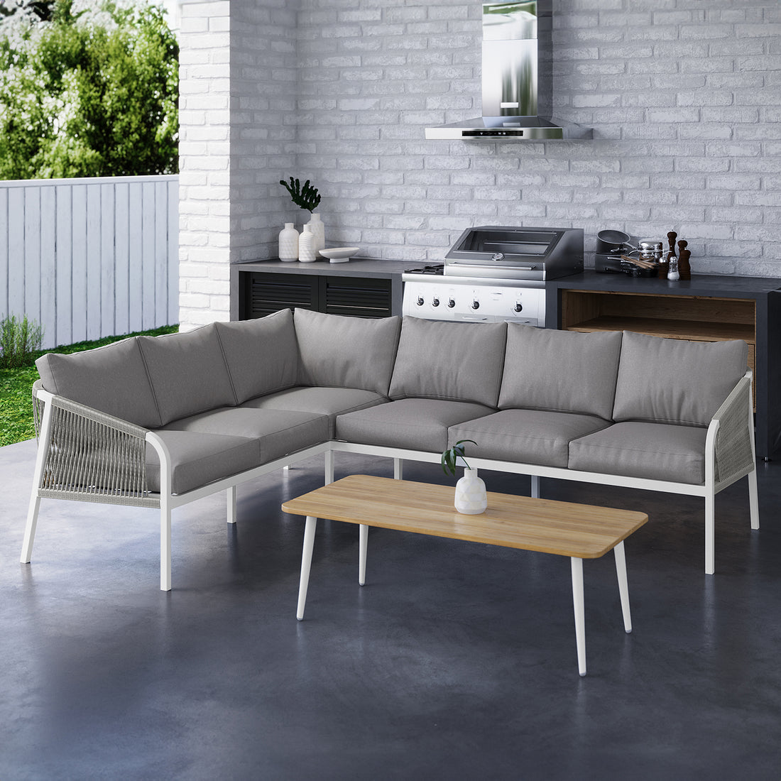 Vernon 4pc Rattan 6-Seater Aluminum Outdoor Lounge Set featuring a sleek design on a wooden table, displaying durable rattan and aluminum craftsmanship, ideal for stylish outdoor seating.