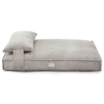 Dax Extra Large Corduroy Dog Bed – Grey Comfort: Close-up of plush, grey corduroy bed with raised bolster sides for support, featuring a non-slip base, ideal for large dogs.