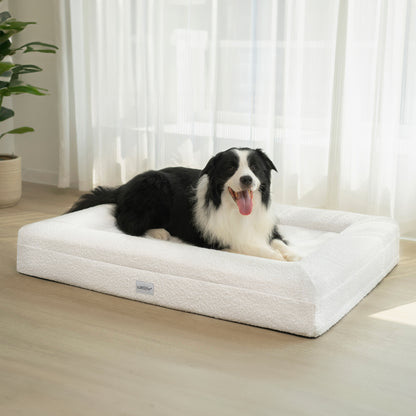 Tyro Luxe Large Orthopedic Pet Bed – Light Beige with a dog comfortably lying on it, showcasing the bed's soft boucle fabric and supportive dual-layer memory foam design for large pets.