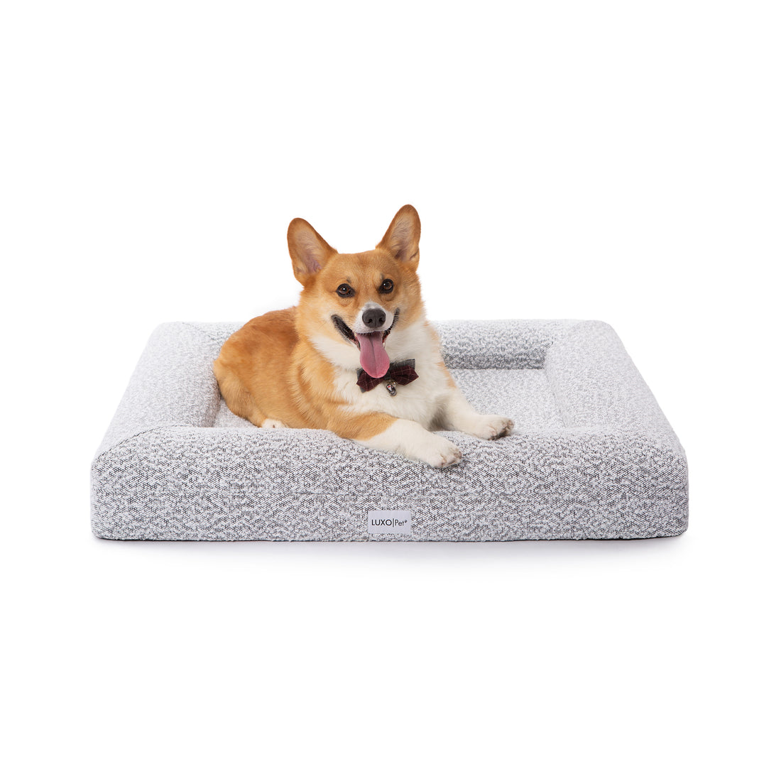 Tyro Luxe Medium Orthopedic Pet Bed – Black & White showing a plush, textured surface with dense cushioning. Ideal for medium-sized pets, it features a supportive, elevated design suitable for modern home interiors.