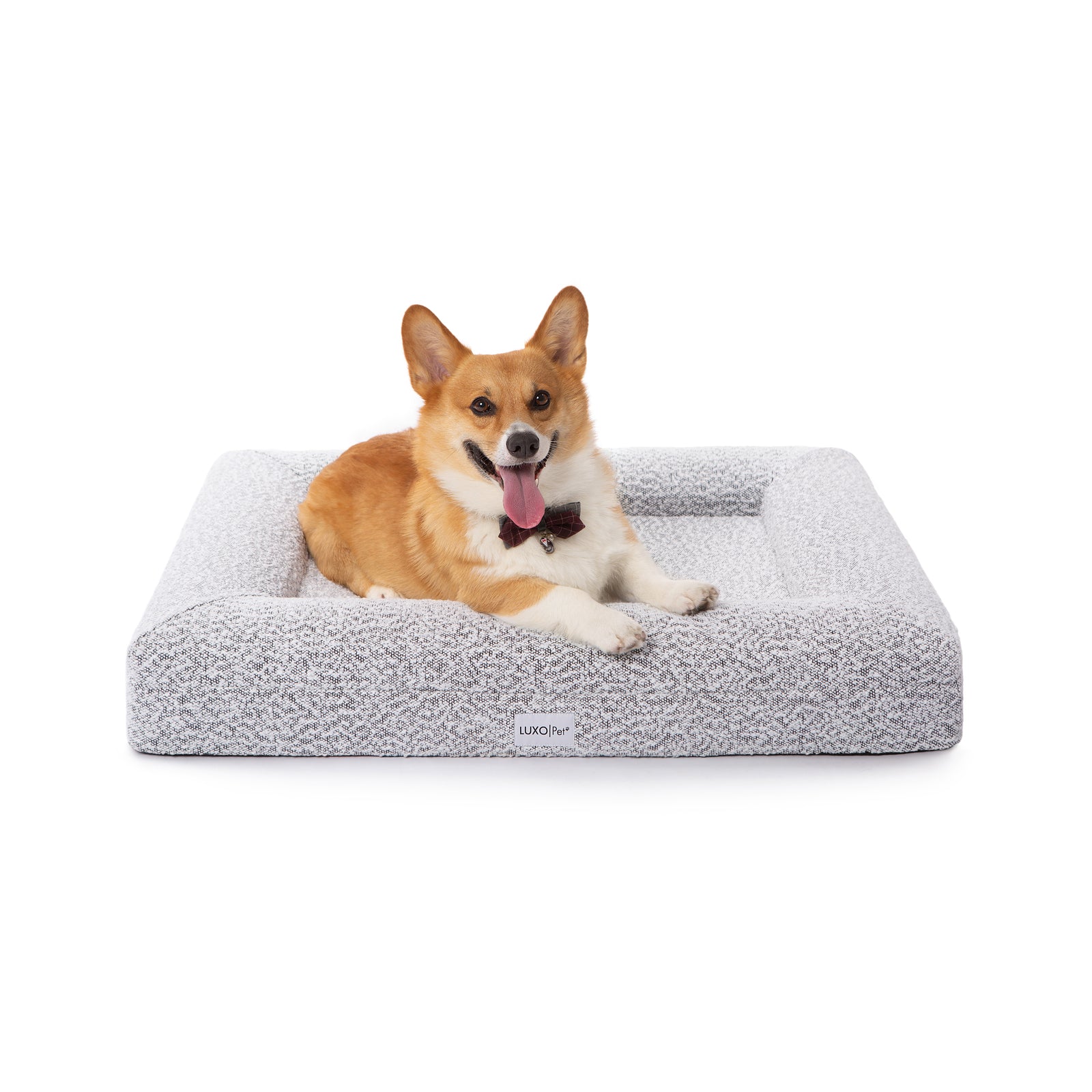 Tyro Luxe Medium Orthopedic Pet Bed – Black & White showing a plush, textured surface with dense cushioning. Ideal for medium-sized pets, it features a supportive, elevated design suitable for modern home interiors.
