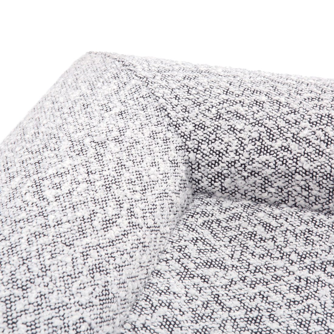 Close-up of the Tyro Luxe Medium Orthopedic Pet Bed showcasing its textured boucle cover and supportive orthopedic memory foam, designed for medium-sized pets seeking comfort and joint relief.