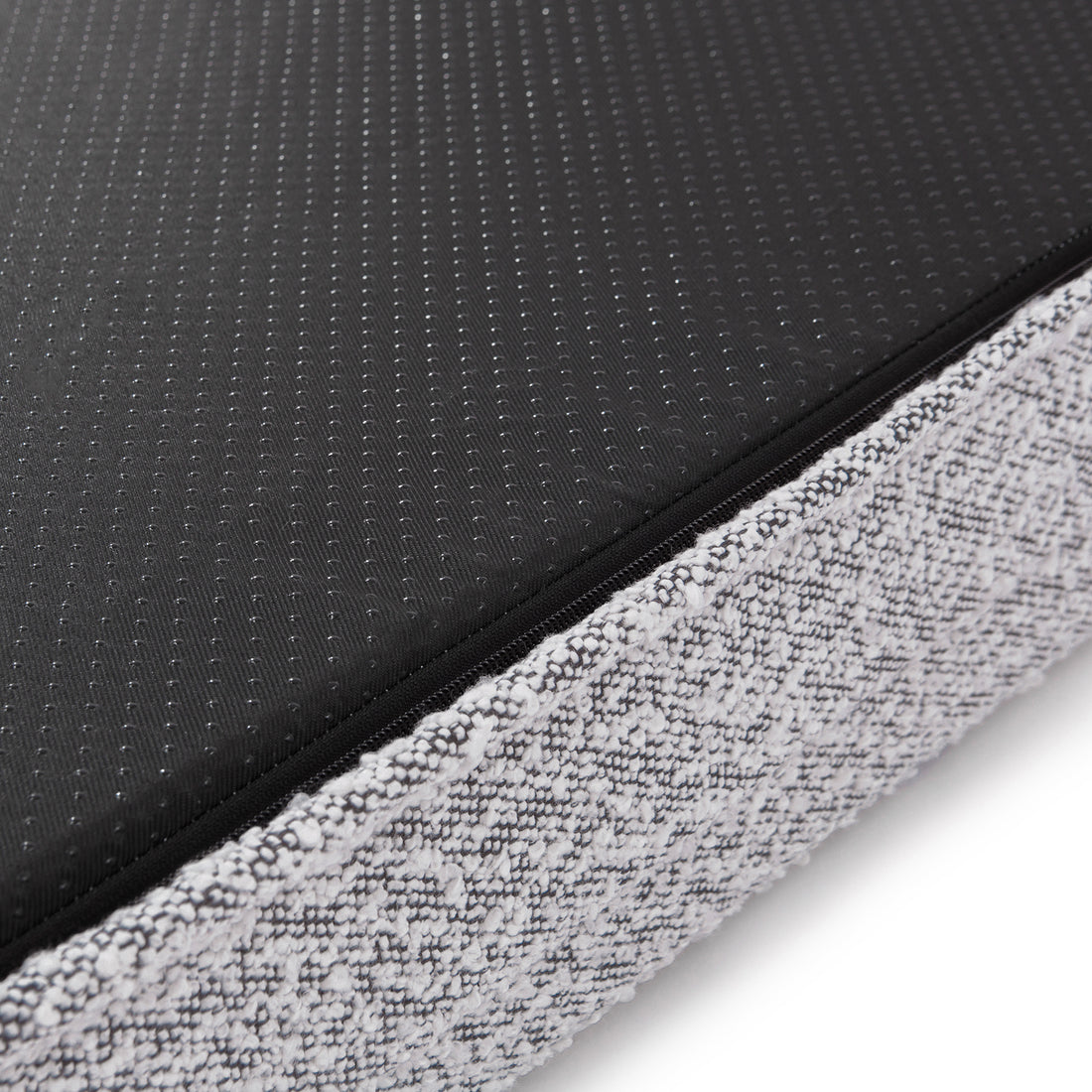 Tyro Luxe Medium Orthopedic Pet Bed – Black & White, featuring a close-up of the textured black and white boucle fabric, highlighting its modern design and cozy finish.