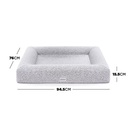 Close-up of the Tyro Luxe Medium Orthopedic Pet Bed – Black & White, showcasing its textured boucle fabric and cushioned structure, designed for medium-sized pets' comfort and joint support.