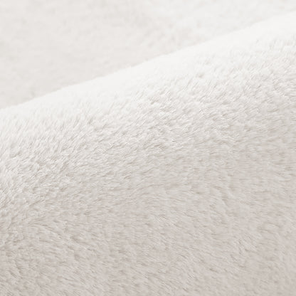 Close-up of the soft, plush surface of the Azaliya 200x300cm Faux Rabbit Fur Floor Rug in Cream White, highlighting its luxurious texture and cozy, napped fibers.