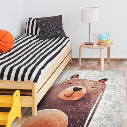 Happy Bear Kids Rug 120x180cm featuring a cute cartoon-style bear design, ideal for children's spaces. Soft, durable with anti-slip backing, enhancing playroom or bedroom aesthetics.
