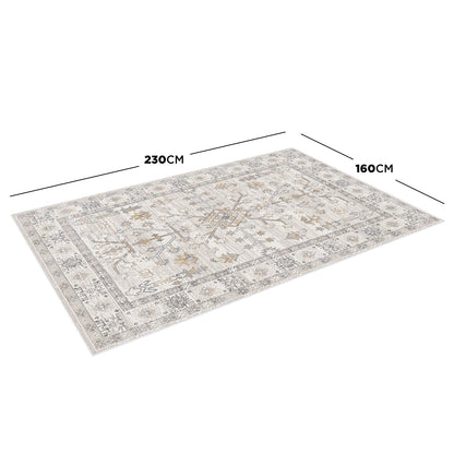 Bortan Persian Indoor Rug 160x230cm featuring a faded vintage-oriental pattern in muted neutrals, showcasing dimensions with overlaid arrows; a stylish, durable addition to high-traffic home areas.