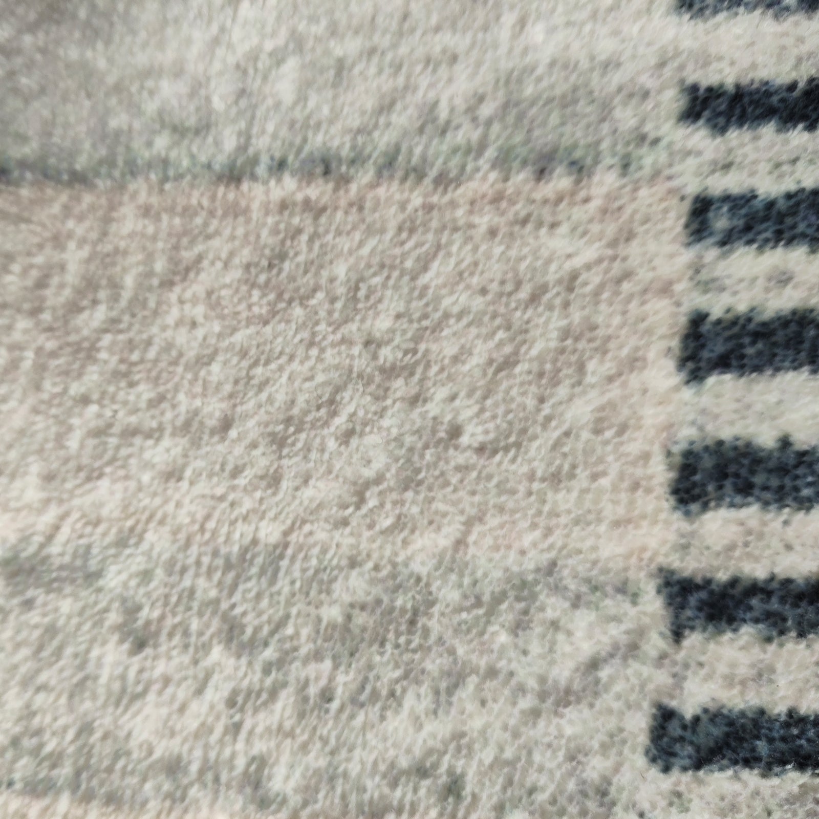 Elimas Soft Contemporary Printed Rug 160x230cm showcases a close-up of its textured surface, highlighting the soft 12mm pile and intricate modern pattern, designed for comfort and style in any room.