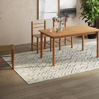Hepirus Soft Contemporary Printed Rug 200x300cm elegantly displayed in a room, showcasing its plush texture and modern heat-printed design, enhancing the cozy ambiance with a vase-topped table and chairs nearby.