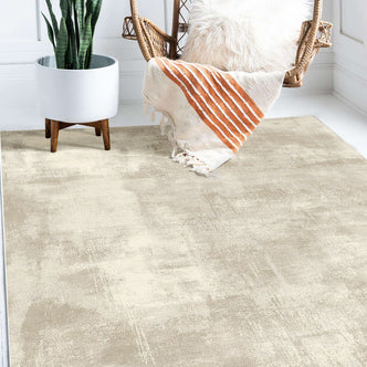 Huken 200x300cm Large Modern Indoor Floor Rug with a soft texture, placed in a bright corner, accompanied by a planter and a woven hanging chair, enhancing contemporary, minimalist décor.