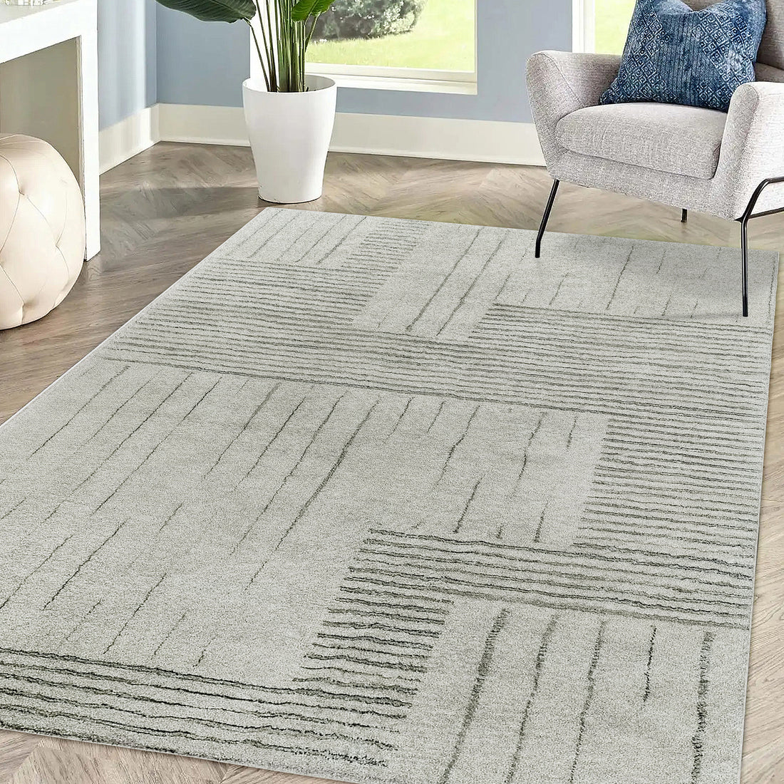 Jabeza Soft Contemporary Printed Rug 160x230cm on a floor, showcasing its soft 12mm pile and modern design. The rug's anti-slip backing ensures stability, ideal for enhancing comfort in any room.