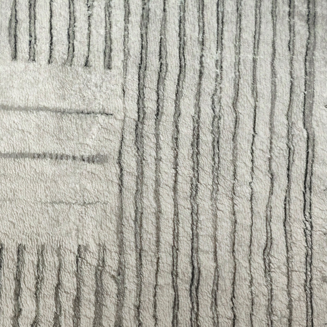 Jabeza Soft Contemporary Printed Rug 160x230cm features an abstract sketch design with a soft 12mm pile, ideal for modern interiors. Enhanced with durable polyester and anti-slip backing for stability and comfort.